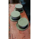 Three grey top hats