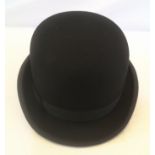 Black bowler hat size 7.