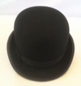 Black bowler hat size 7.