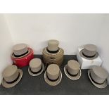 Selection of grey top hats in various sizes.