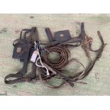 Pair of reins with 2 heavy horse bridles.