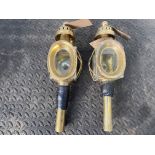 Pair of oval fronted brass lamps