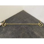 Brass rein rail. This lot carries VAT.