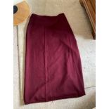 Maroon wool apron lined blue, 39x41" with adjustable fastening.