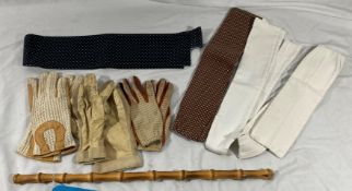 Riding cane 55cms, three pairs of leather gloves and 4 stocks