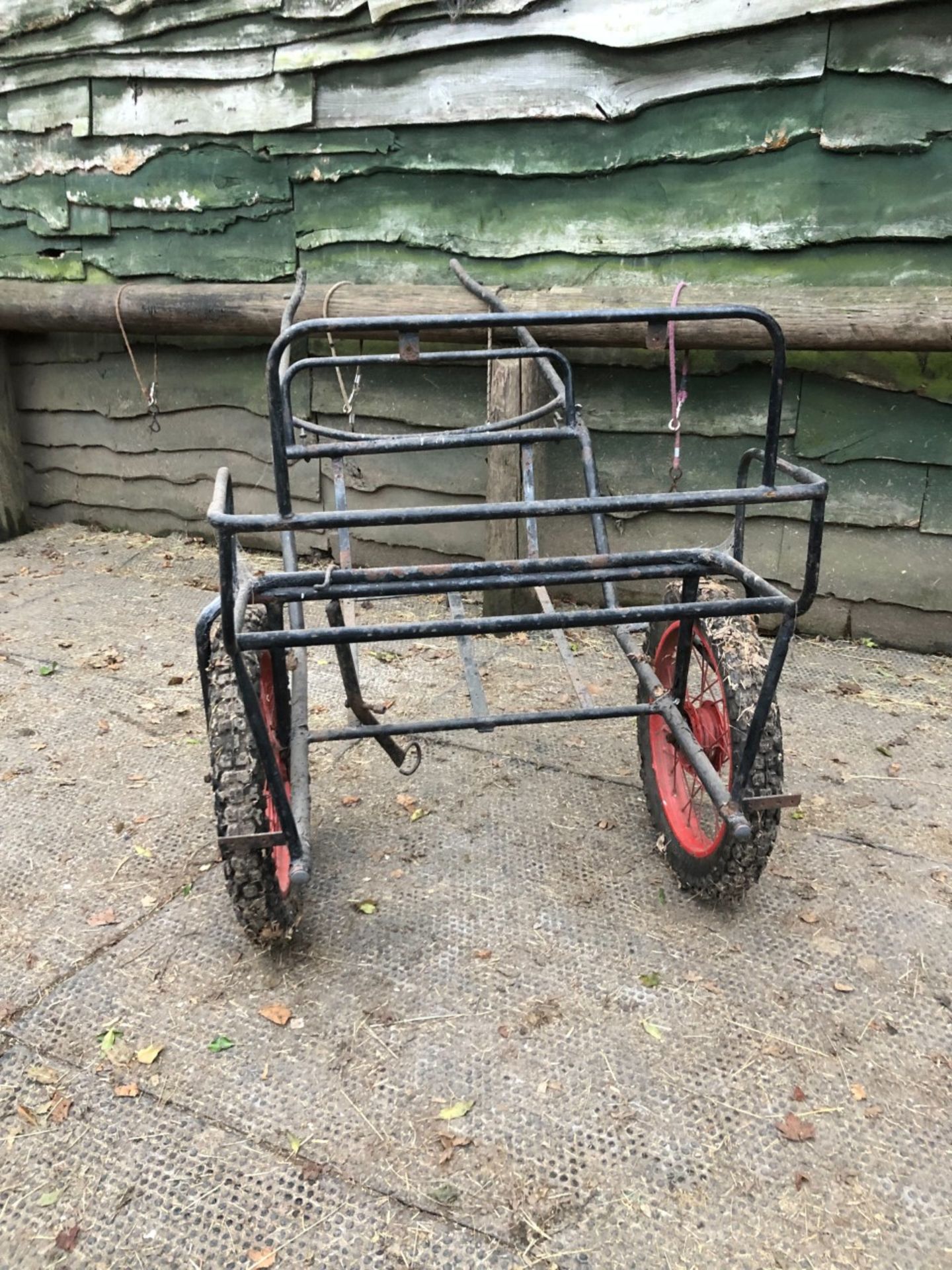 EXERCISE CARRIAGE FRAME painted black with new red wire wheels on pneumatic tyres. - Image 2 of 3