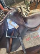 English saddle, irons and leathers.