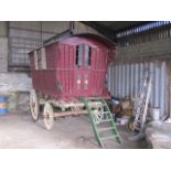 READING VAN the outward sloping ribbed sides recently painted maroon with yellow and red window