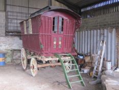 READING VAN the outward sloping ribbed sides recently painted maroon with yellow and red window