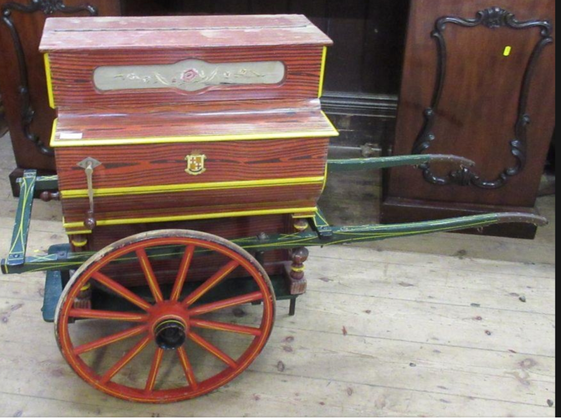 BARREL ORGAN AND HAND CART the barrel organ manufactured by Benito Vela of Barcelona, on a 2 wheel