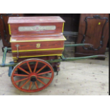 BARREL ORGAN AND HAND CART the barrel organ manufactured by Benito Vela of Barcelona, on a 2 wheel