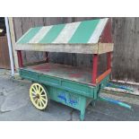 MARKET STALL hand cart. A covered stall on 2 iron shod wheels, with wiring to 13 amp socket. Size of