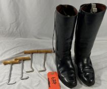 Black leather lady's riding boots, together with 2 pairs of chrome and wood handled boot pulls.