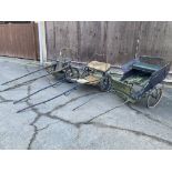 FOUR EXERCISE CARTS comprising three 2 wheel carts with metal frames and wire wheels; together