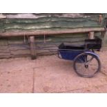 EXERCISE VEHICLE painted blue and black on wire wheels with pneumatic tyres.