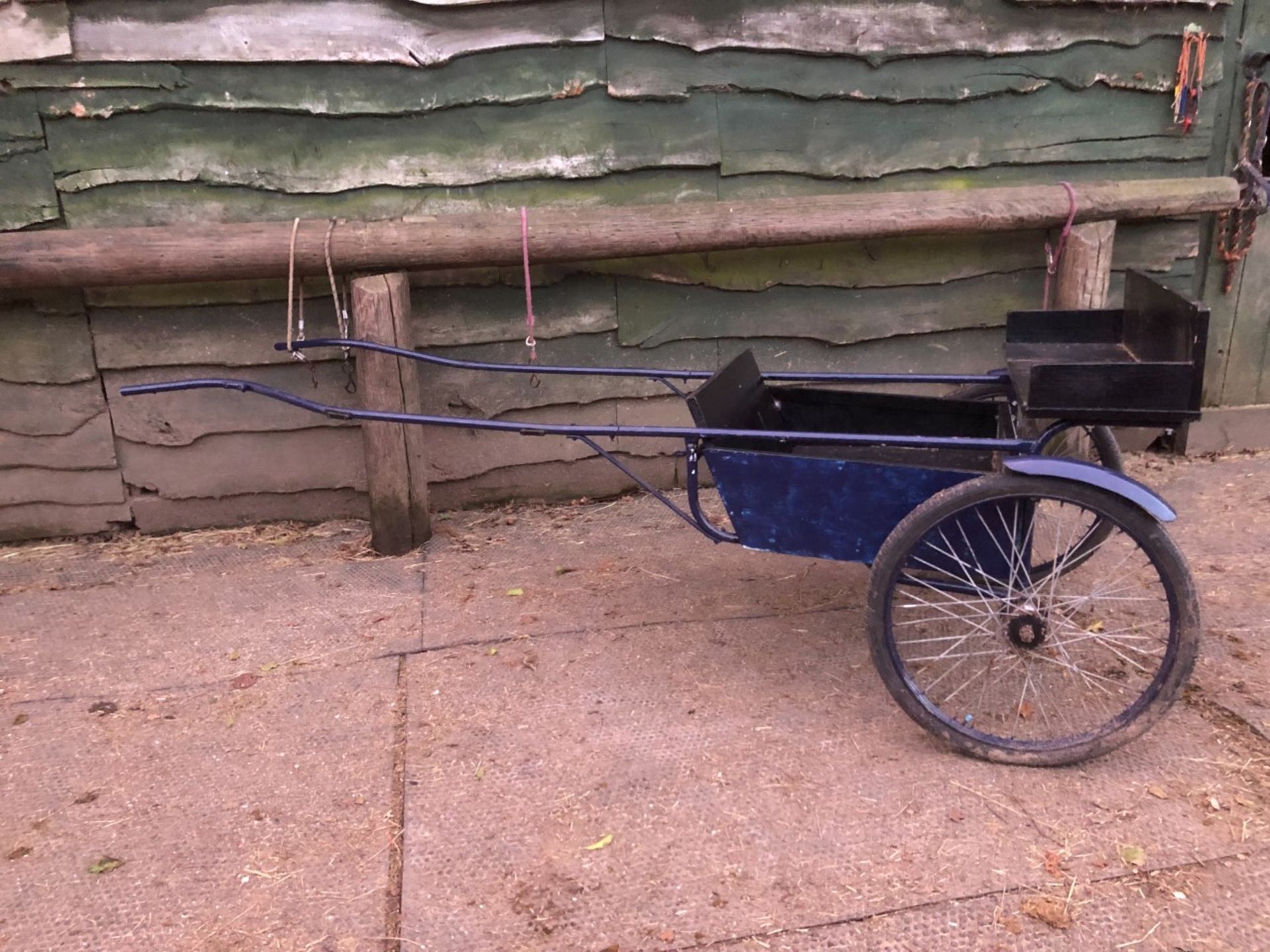 EXERCISE VEHICLE painted blue and black on wire wheels with pneumatic tyres.