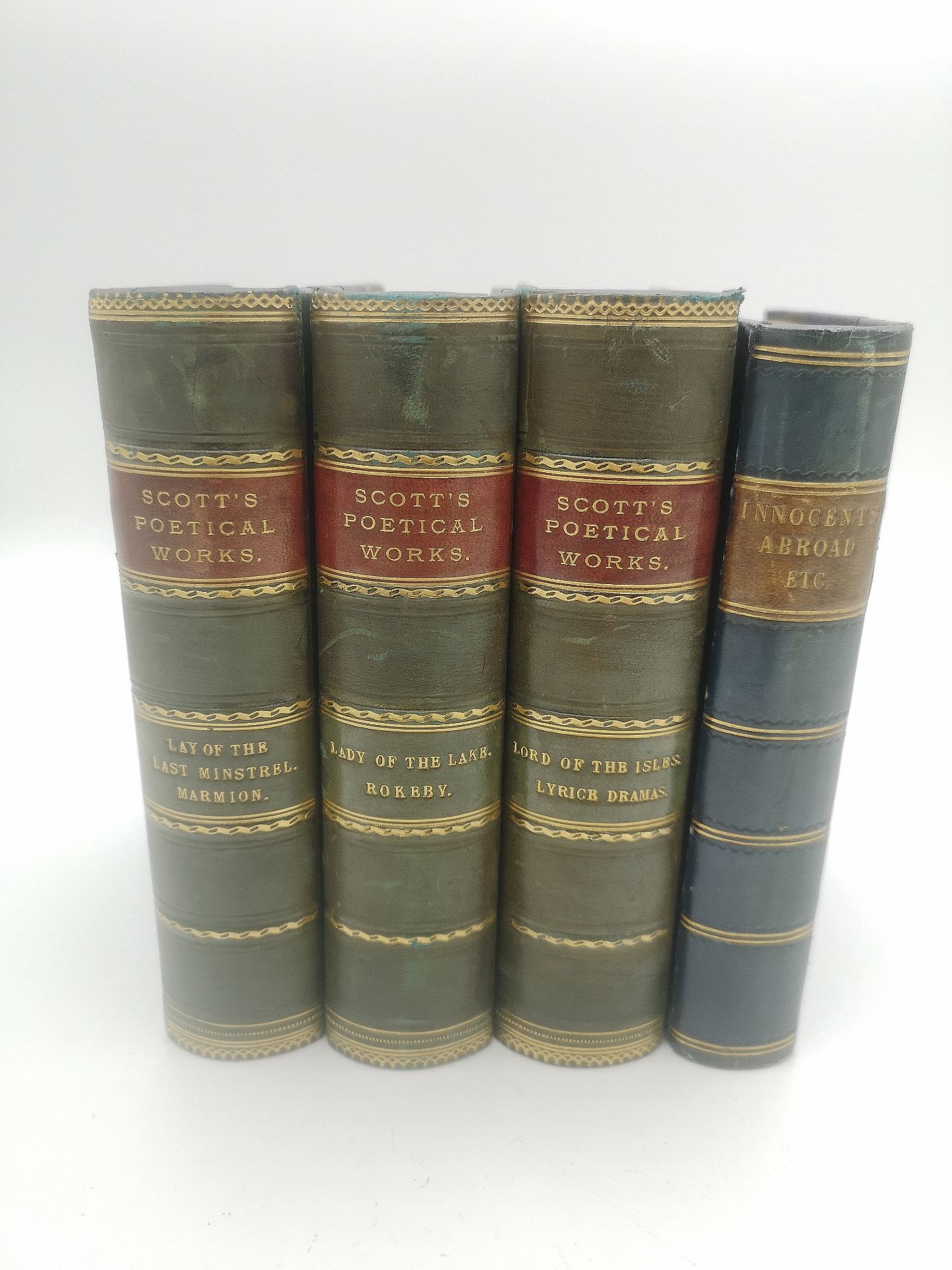 Three half bound volumes of Scott's Poetical Works
