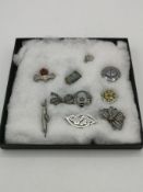 Collection of silver brooches