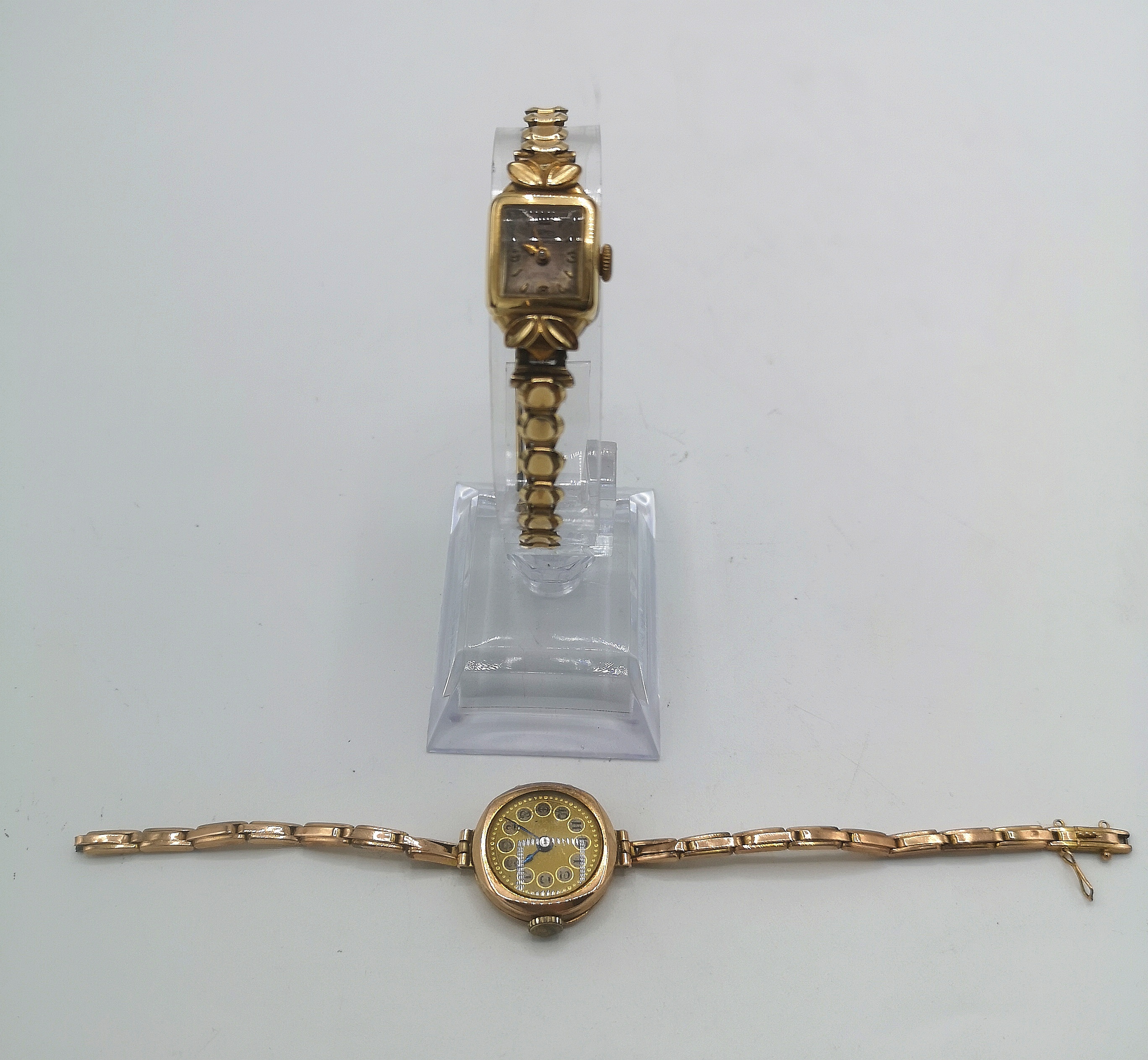 9ct gold wrist watch; 9ct gold expandable strap together with a Roamer wrist watch