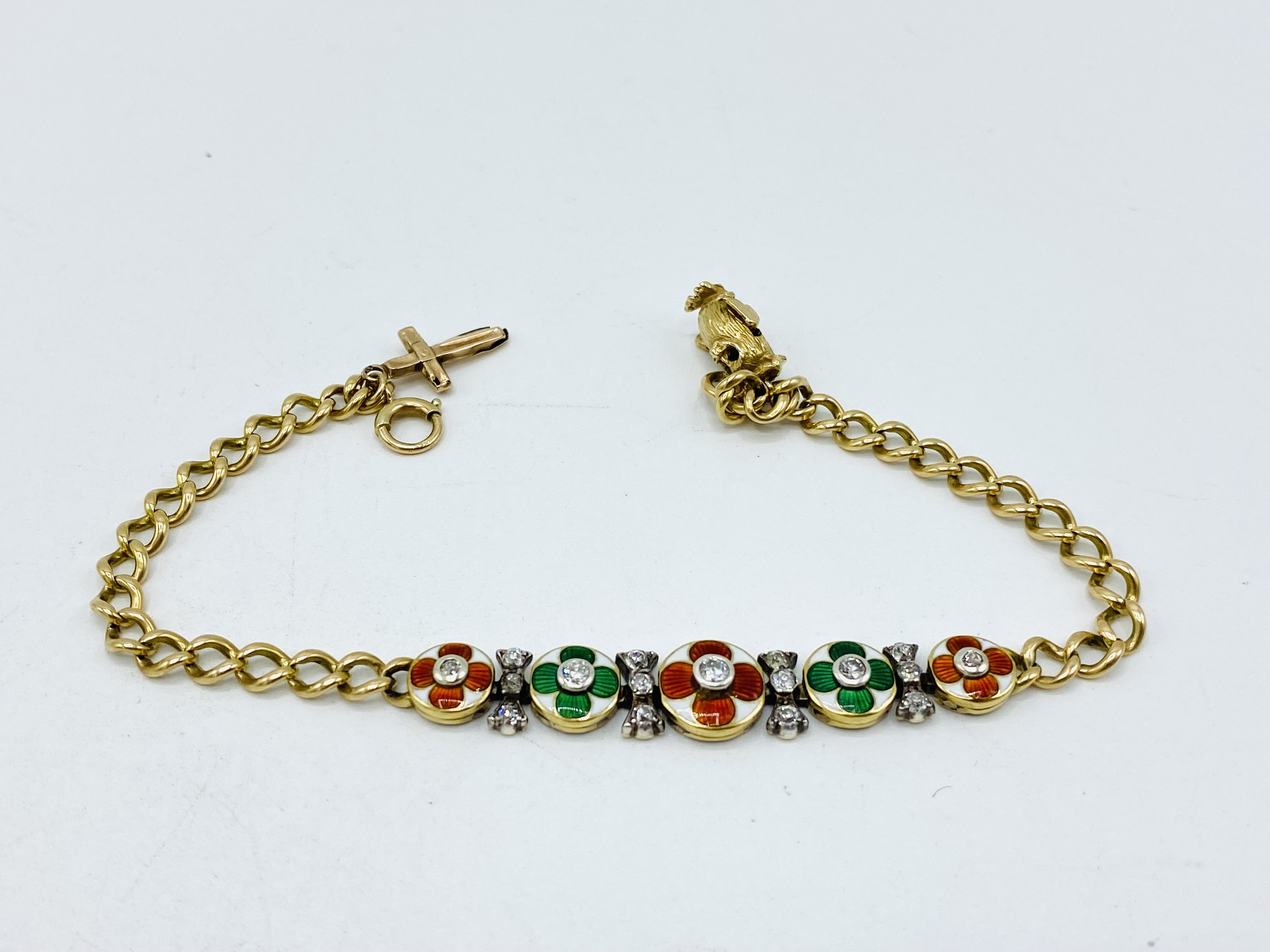 18ct gold bracelet with enamel flowers set with diamonds