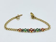 18ct gold bracelet with enamel flowers set with diamonds