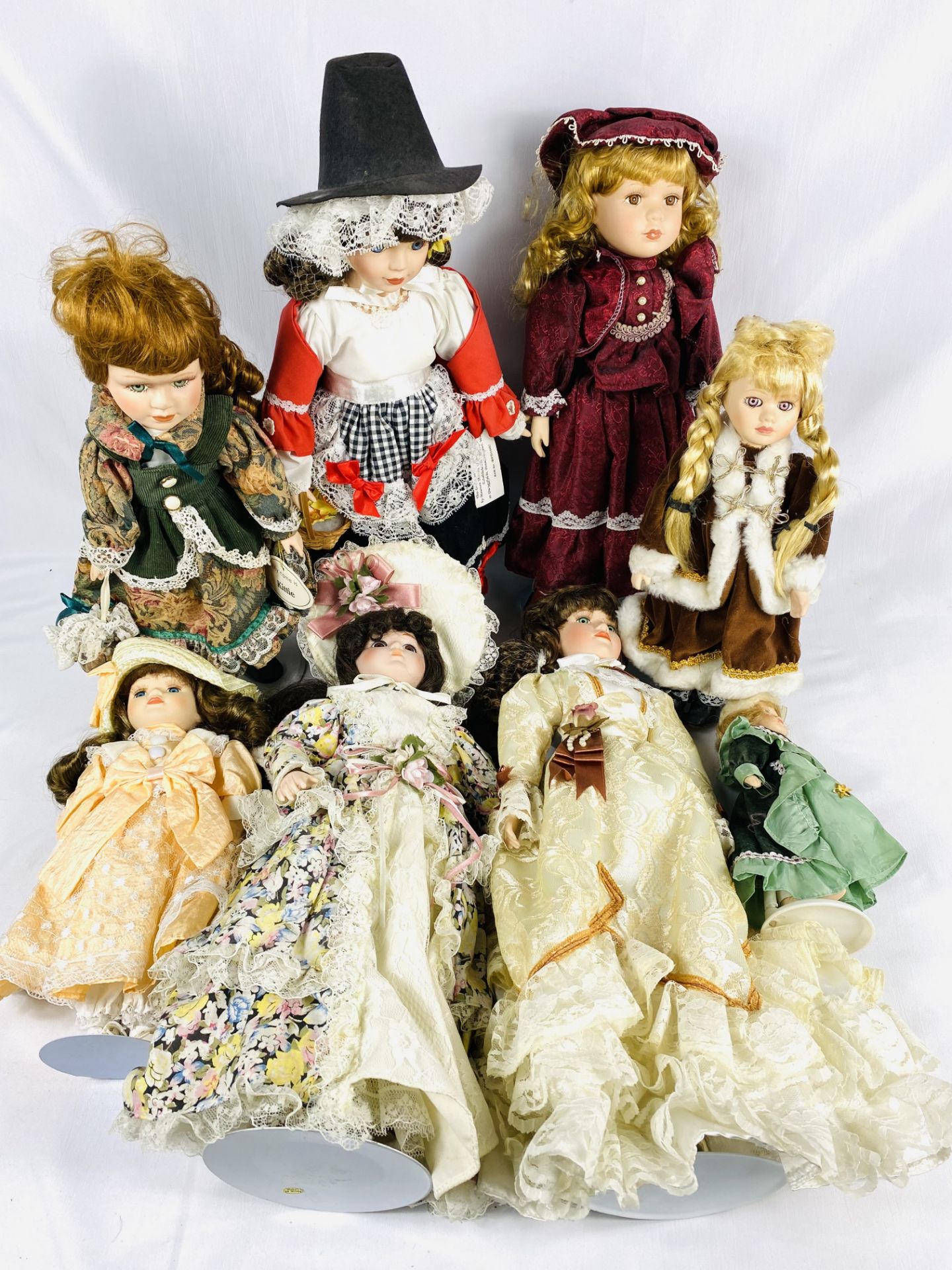 Eight collectors dolls