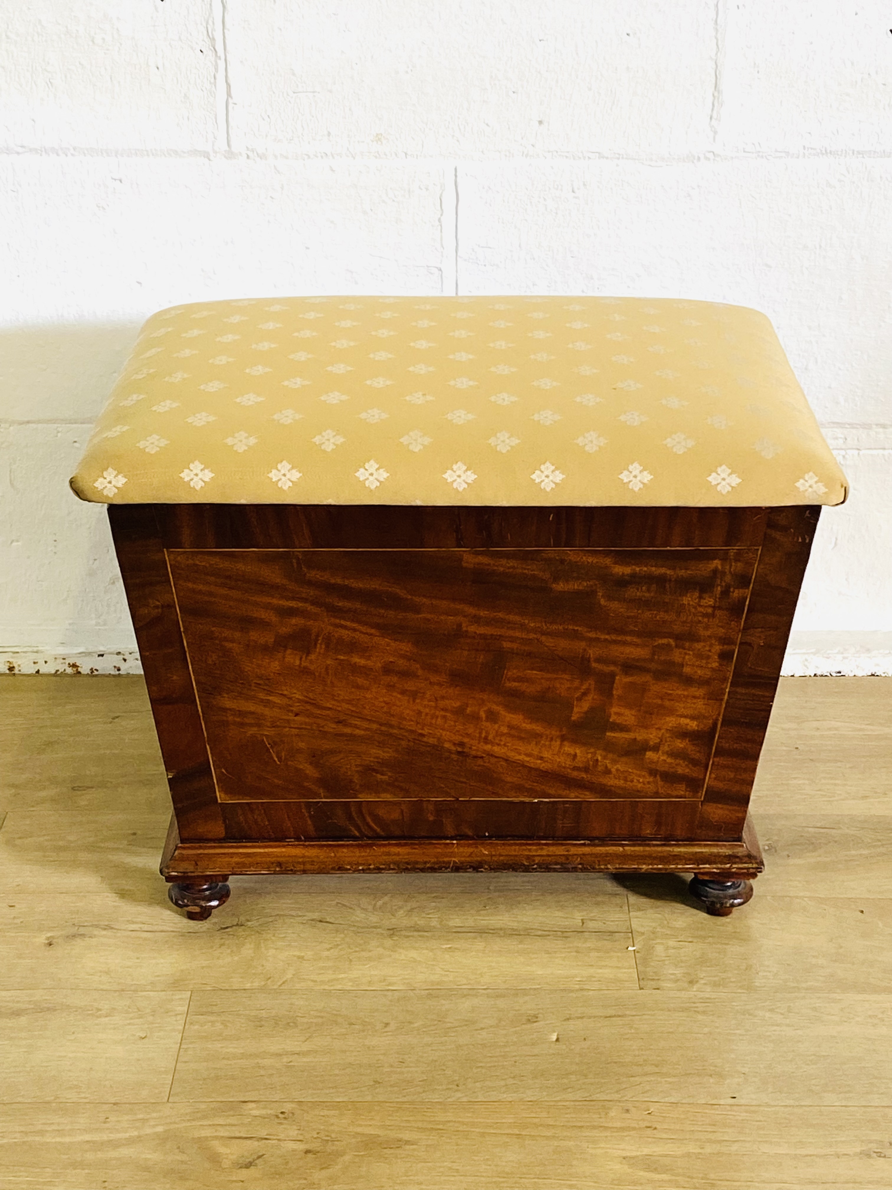 Victorian ottoman with padded seat