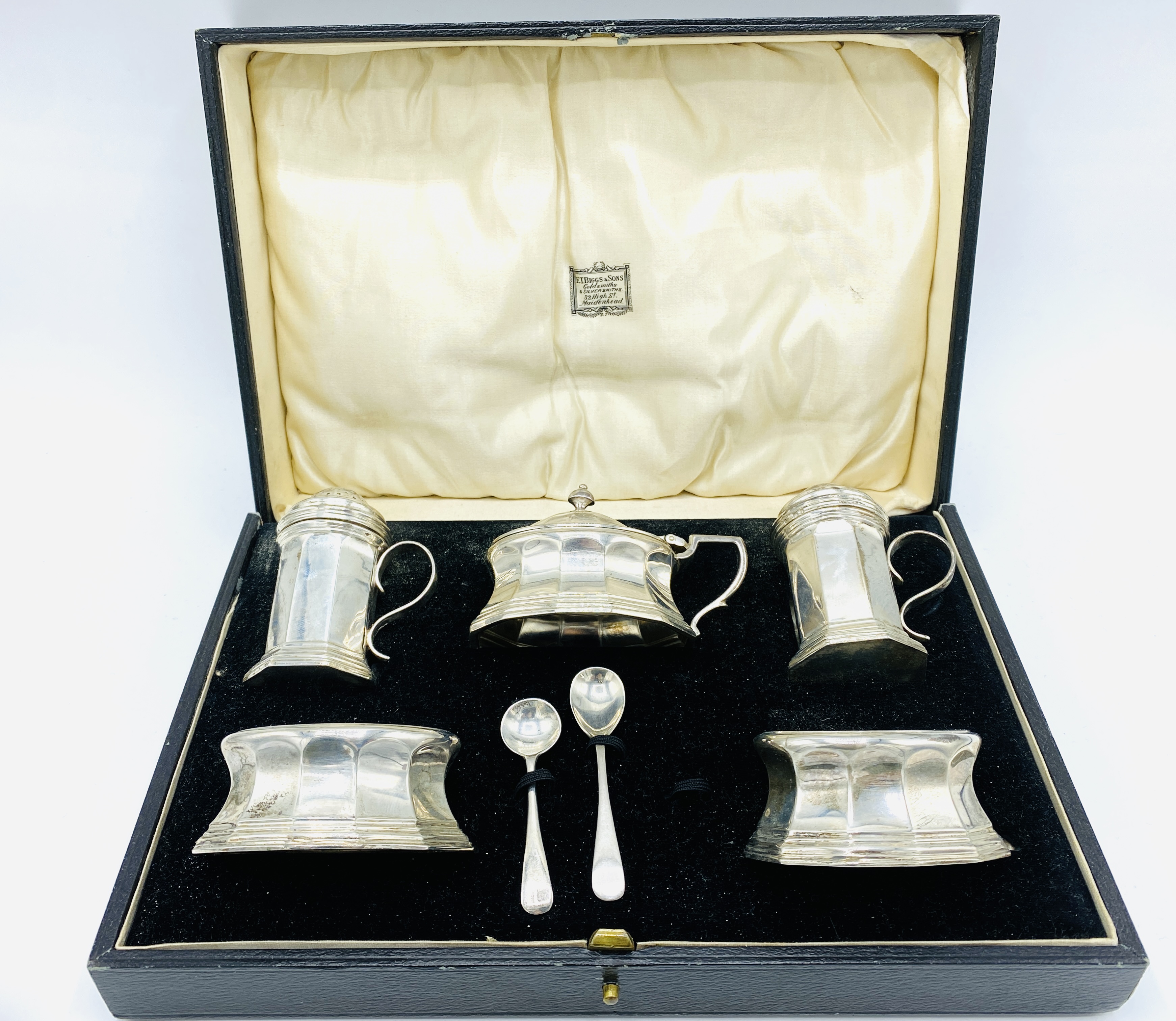 A silver trencher style cruet set by Charles & Richard Comyns, London 1921