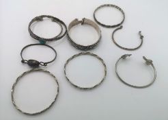 Collection of nine silver bangles