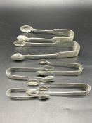 Six pair of silver sugar tongs