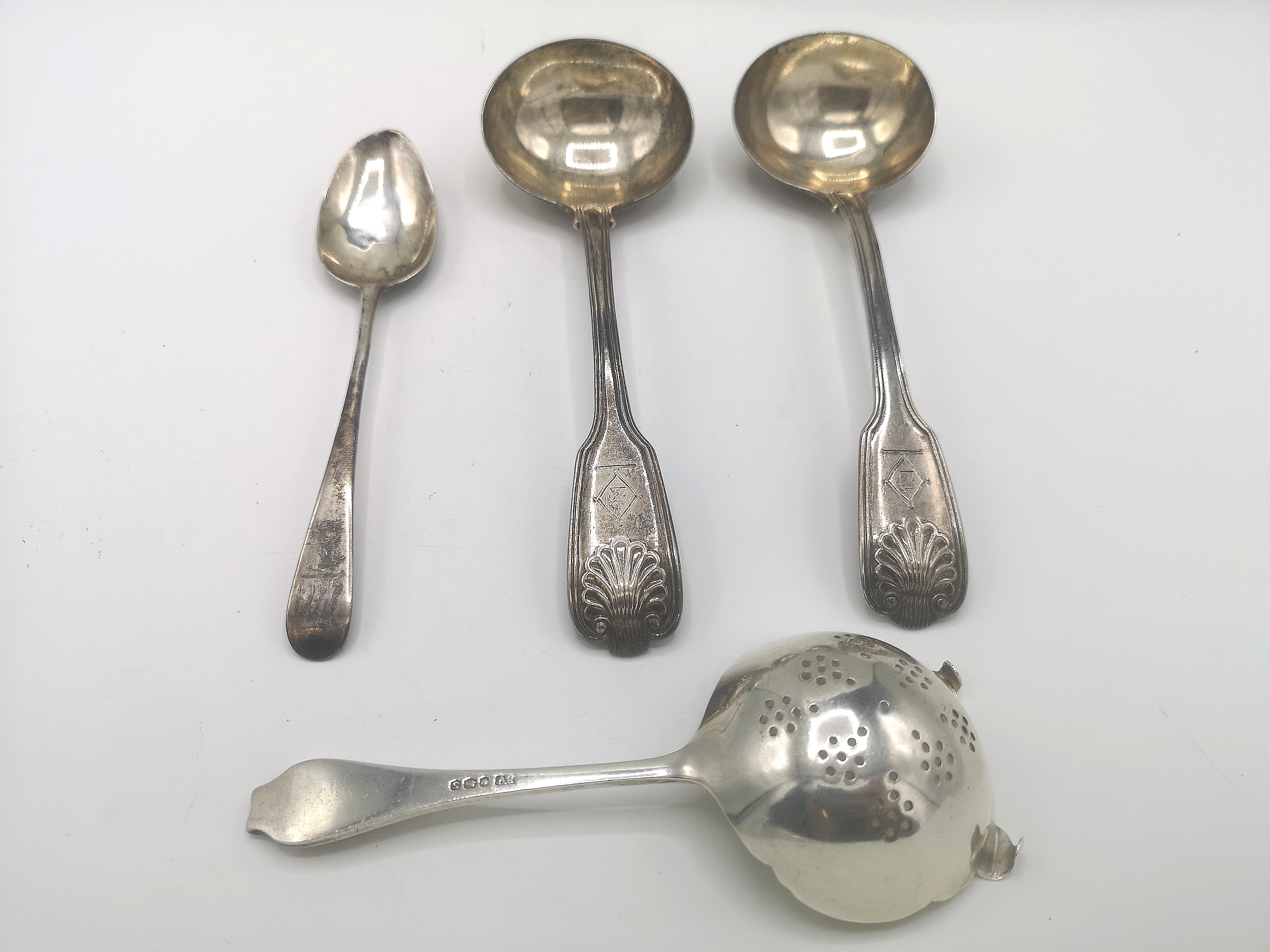 Silver tea strainer and other items