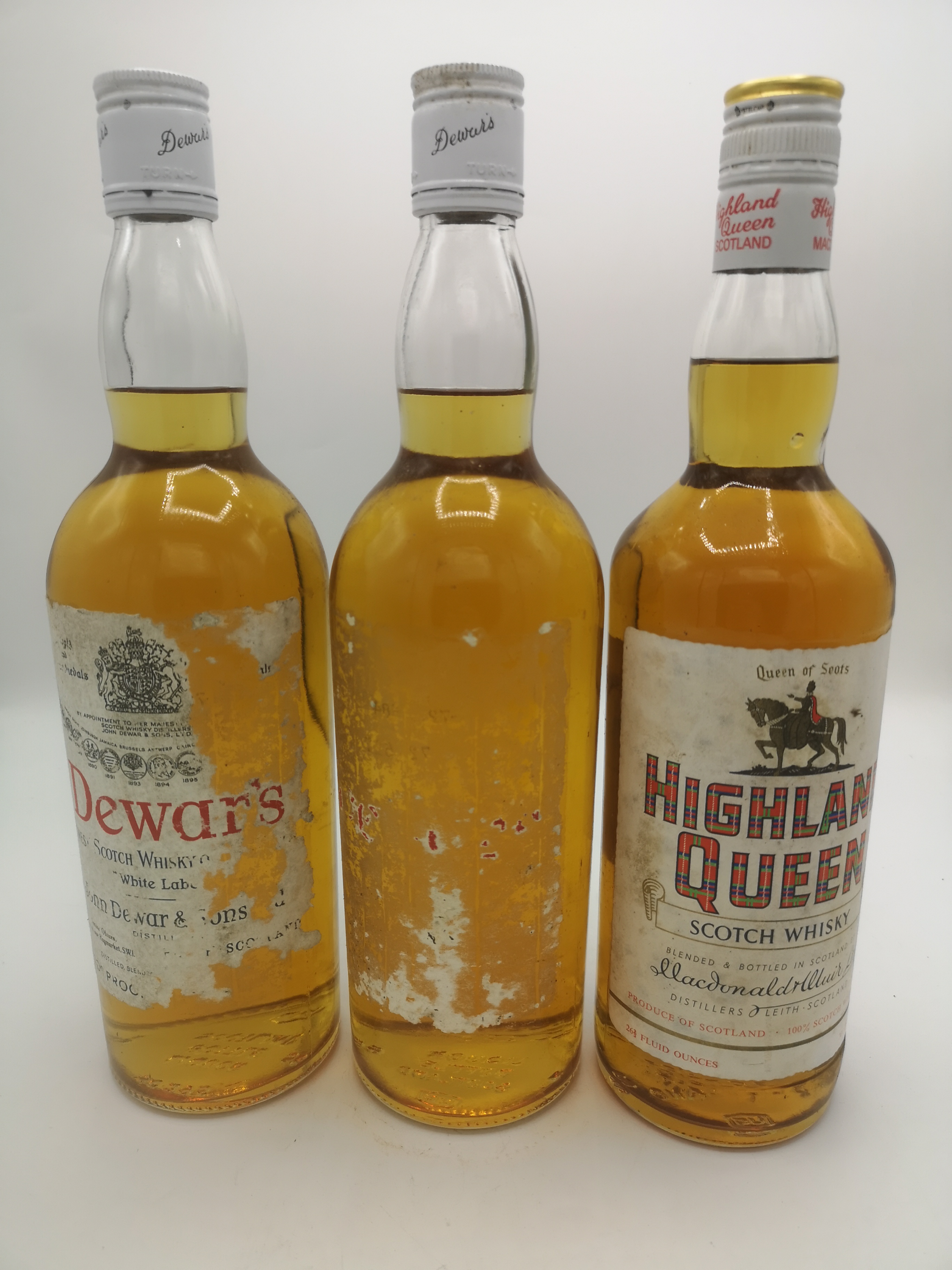 Two bottles of Dewar's Scotch whisky