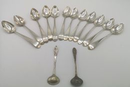 Two sets of silver spoons