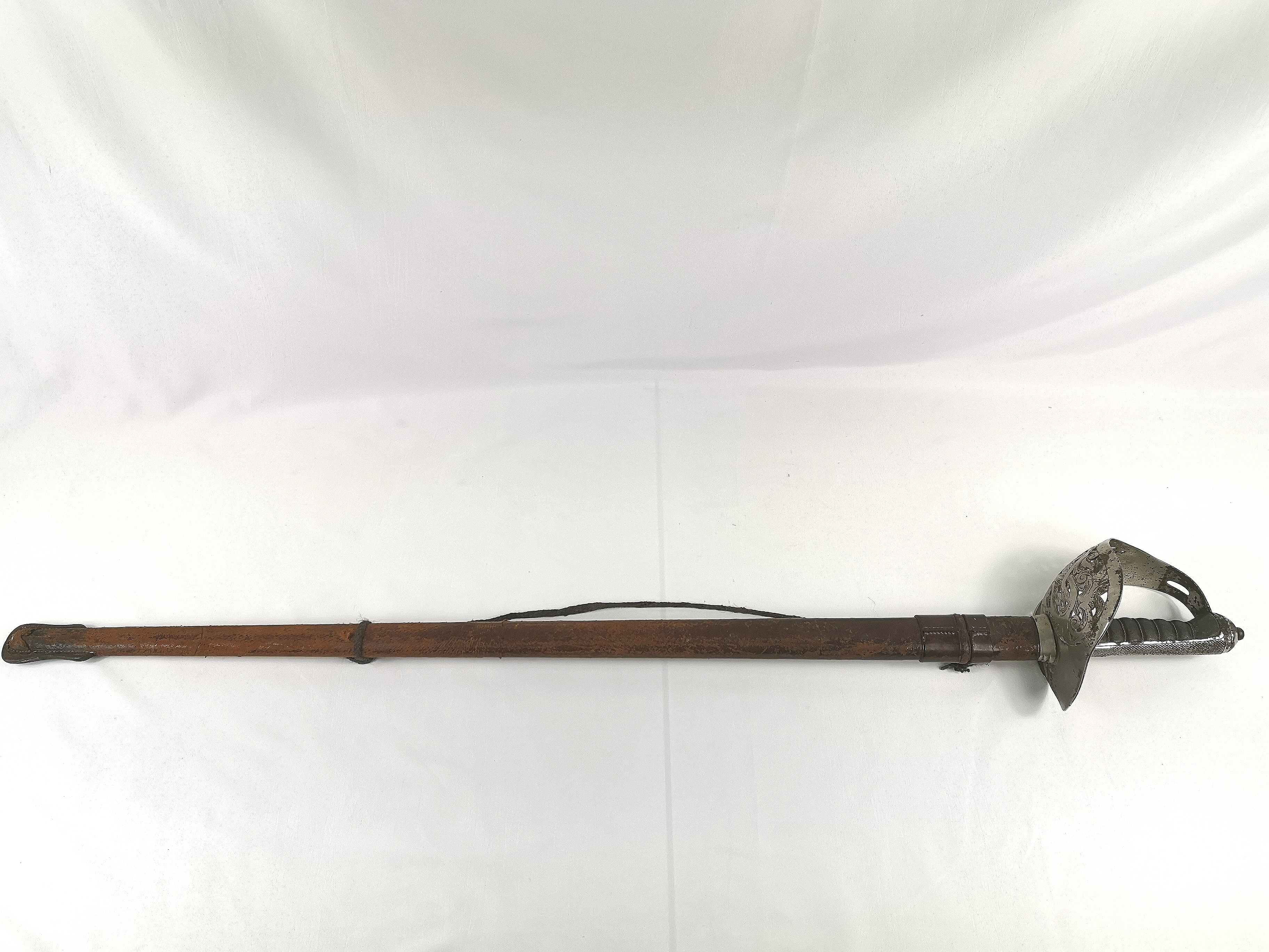 Dress sword with leather scabbard