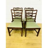 Four mahogany ladder back chairs
