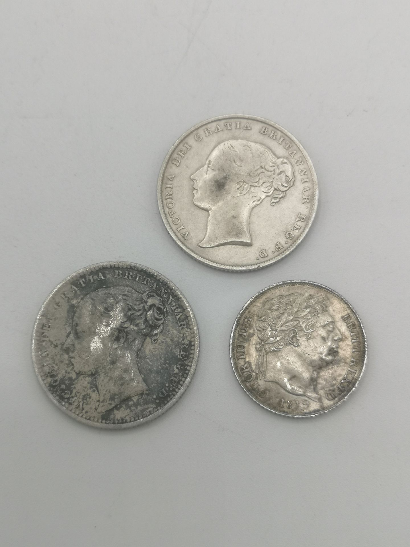 1819 silver sixpence; 1839 silver shilling; 1872 shilling.