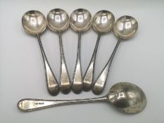 Five silver soup spoons together with a matched silver soup spoon