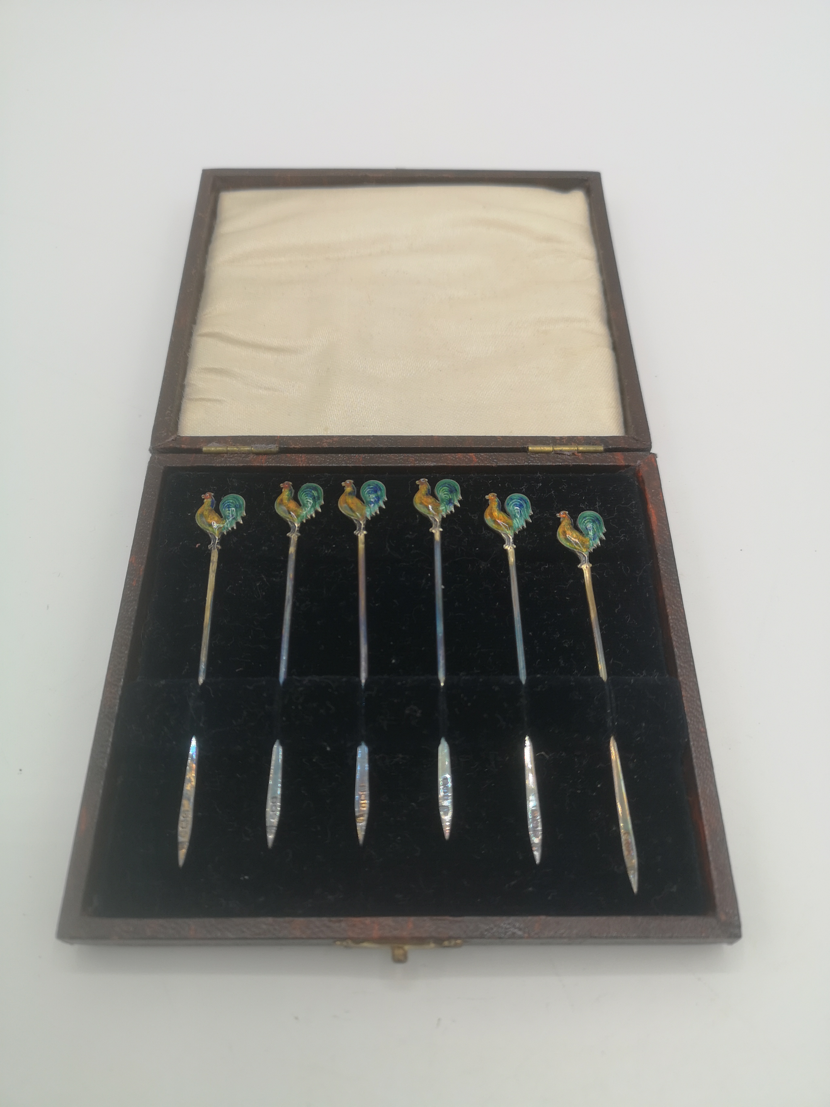 Boxed set of six silver cocktail sticks