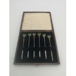 Boxed set of six silver cocktail sticks