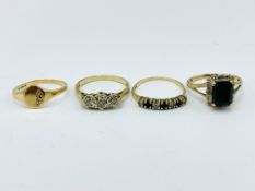 Four 9ct gold rings