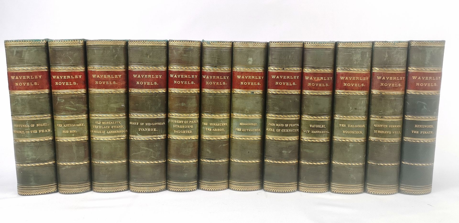 The Waverley Novels by Sir Walter Scott, twelve half bound volumes
