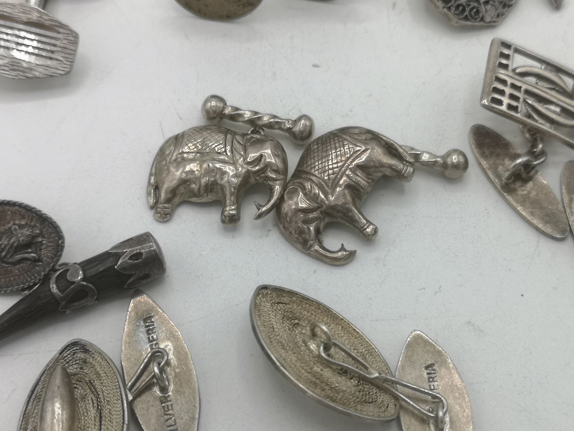 Six pairs of silver cufflinks - Image 6 of 6