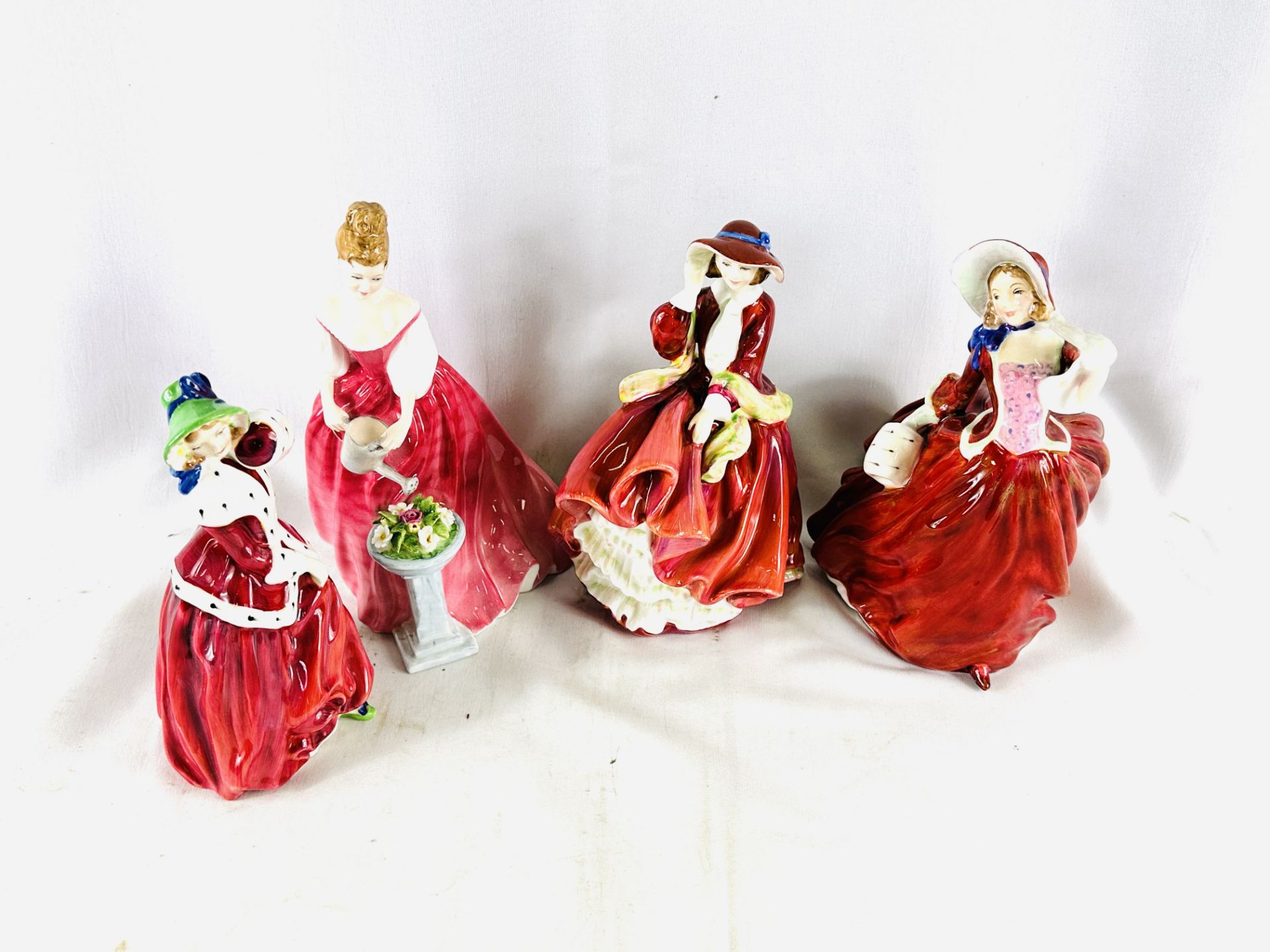 Four Royal Doulton figures