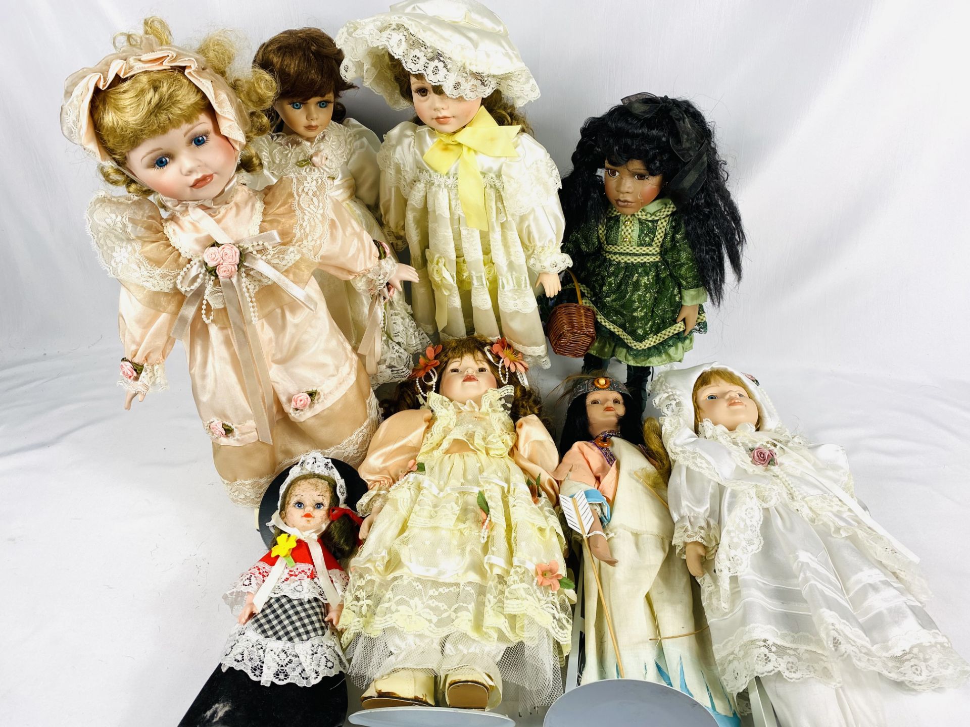 Eight collectors dolls