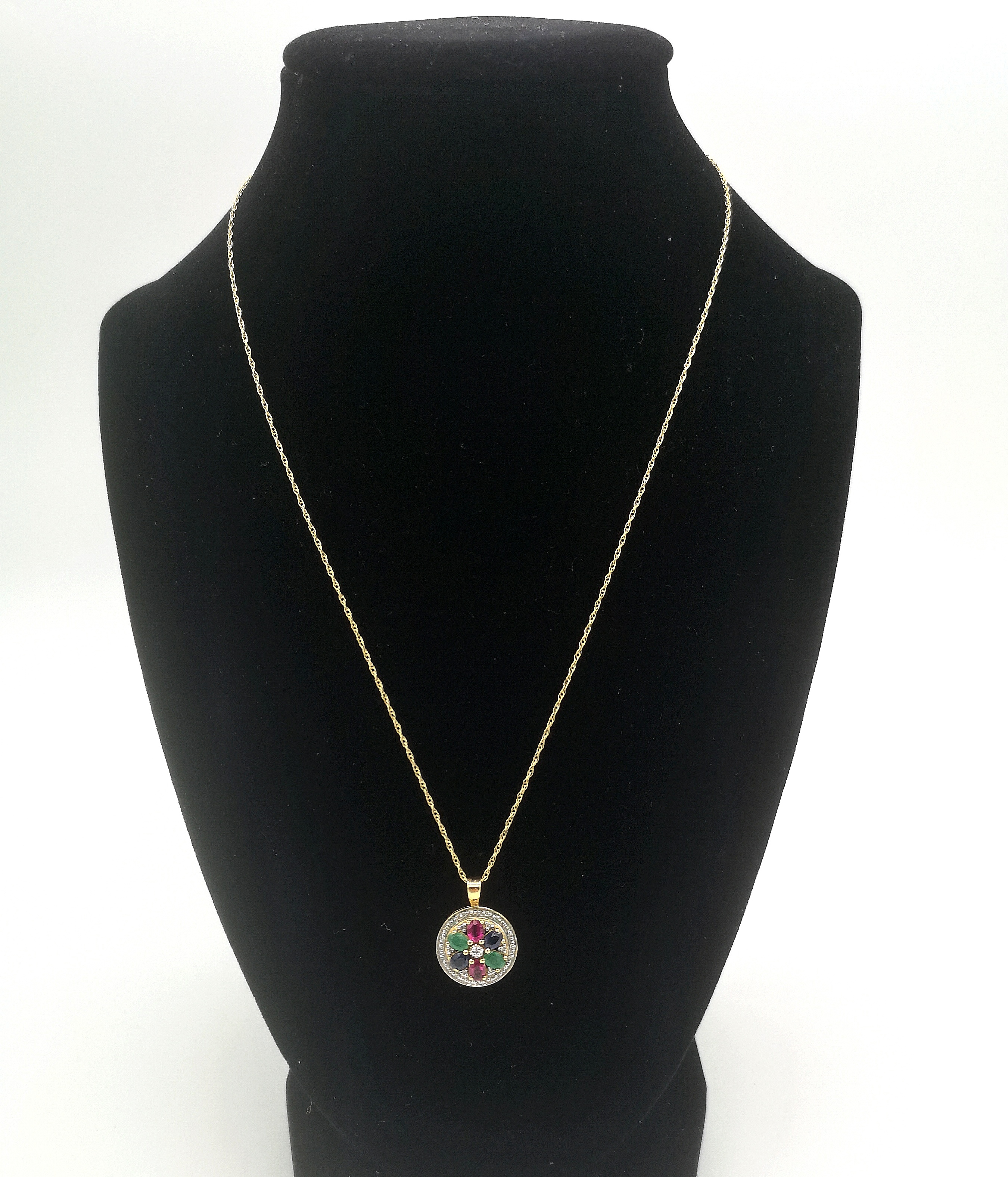 9ct gold pendant set with rubies, emeralds and sapphires