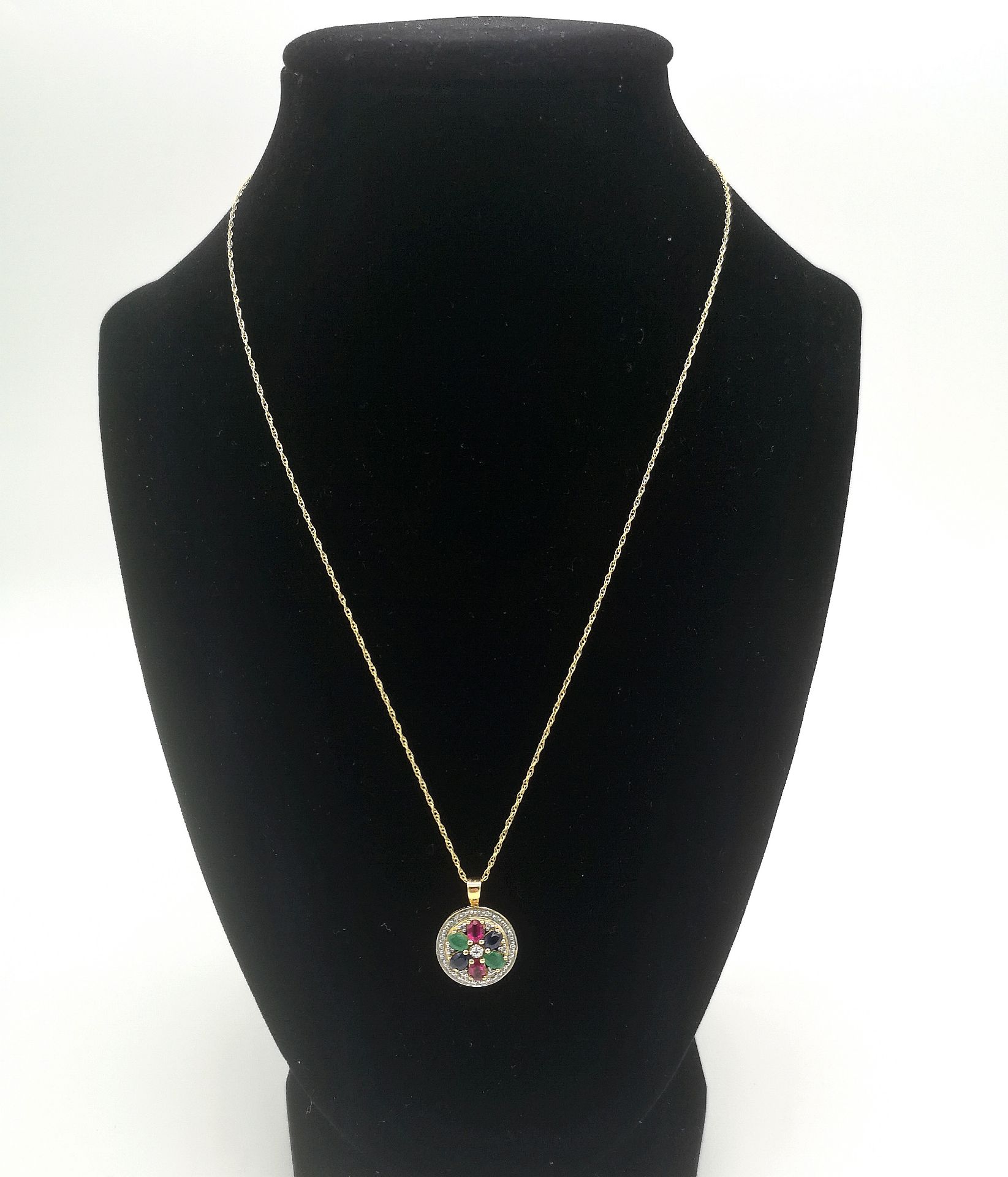 9ct gold pendant set with rubies, emeralds and sapphires