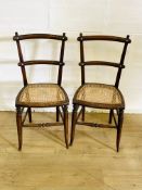 Pair of mahogany ladder back chairs