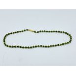 18ct gold and jade bead necklace