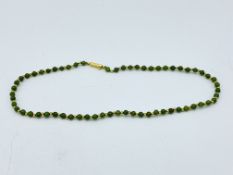 18ct gold and jade bead necklace