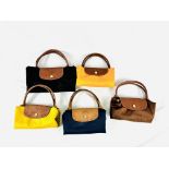 Five Longchamps fold out canvas bags with leather trim